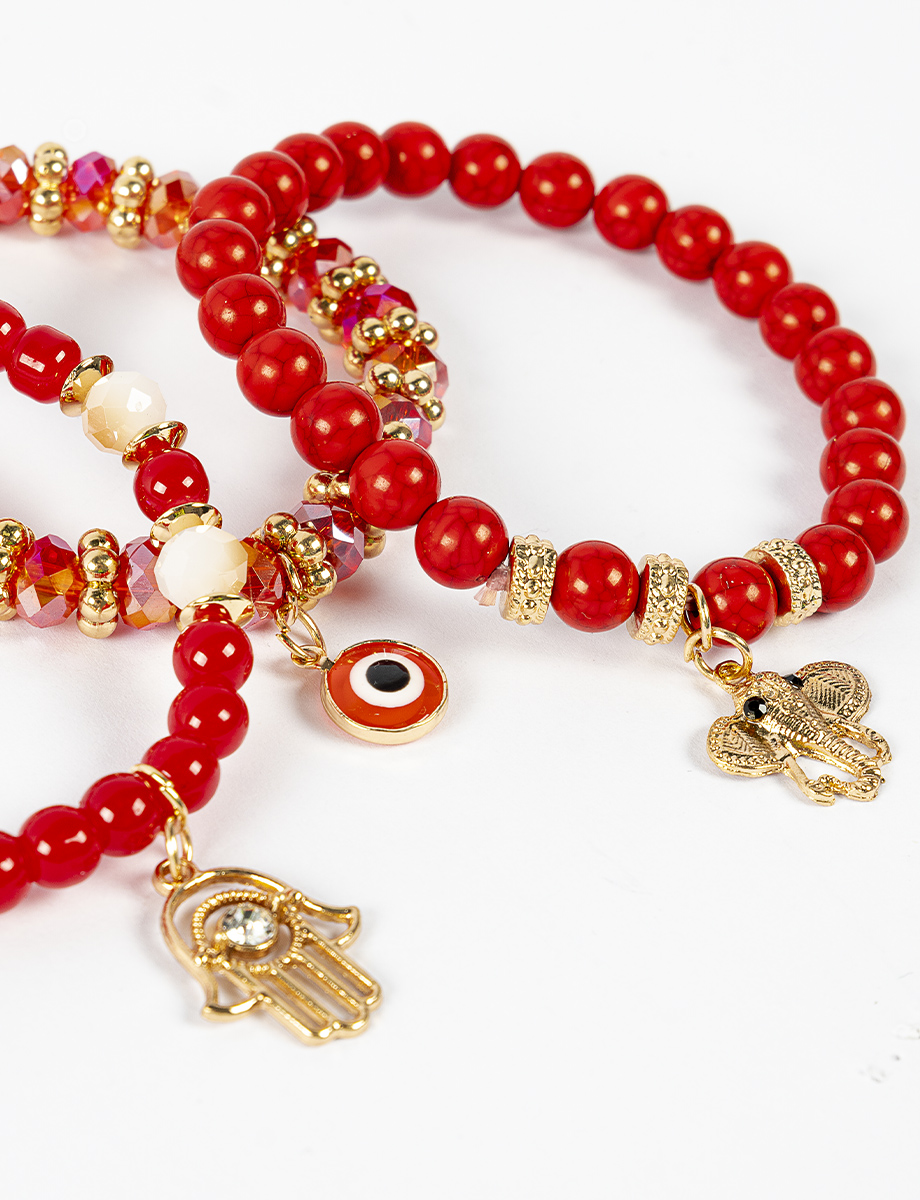 Pulsera x 3 perlas rojas con dijes