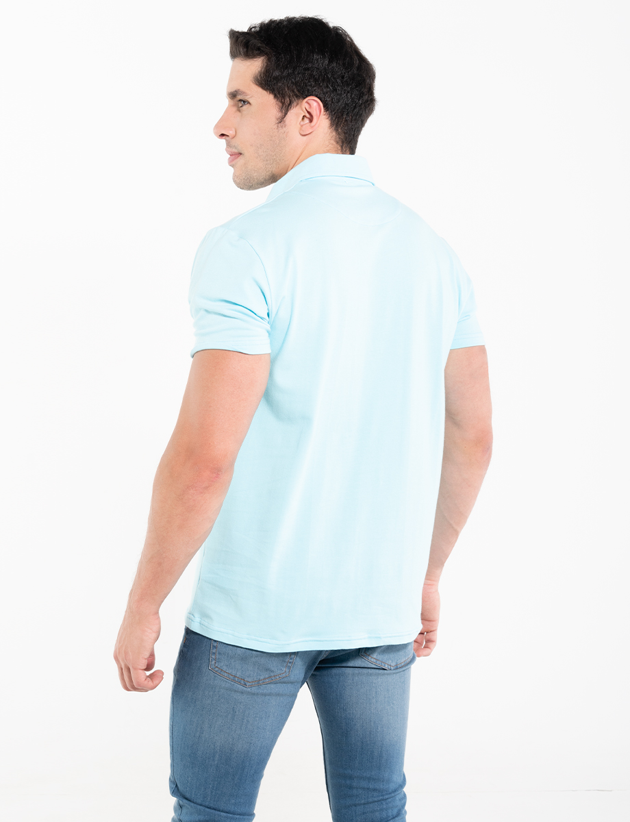 Polo turquesa con bolsillo