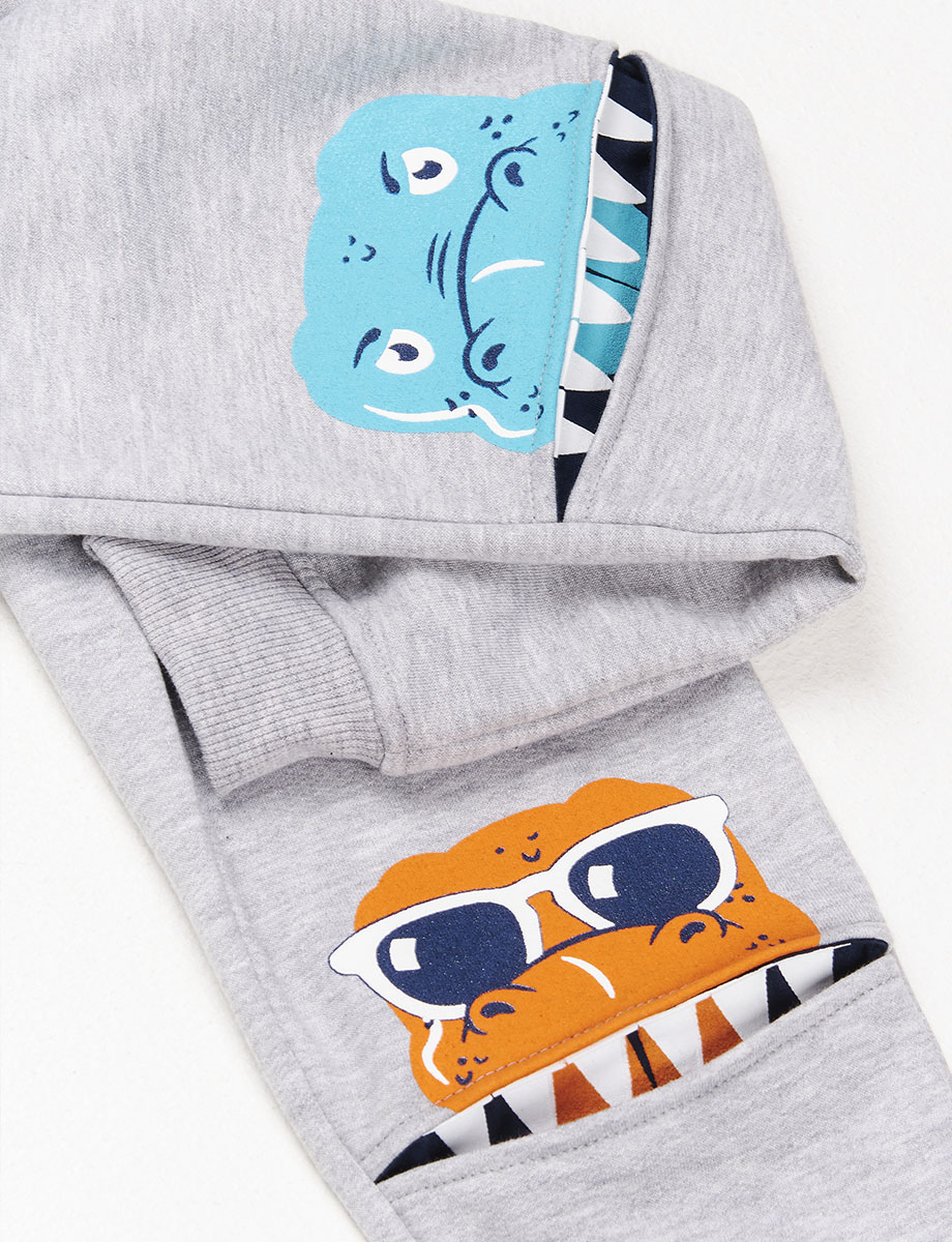 Jogger gris Dinosarurios